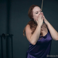 Redhead plumper Summer Hart has her ass turned red while restrained in dungeon