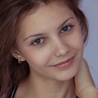 Ukrainian solo girl Emma Sweet creams herself while disrobing for nude poses