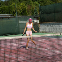 Young lesbians Adelle Unicorn Kiara Cole share a dildo after a tennis match