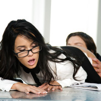Glasses adorned brunette pornstar Megan Rain taking hardcore sex in office