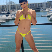 Brunette chick Brooklyn Gray sports short hair while modeling and sucking cock