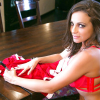 Brunette Abigail Mac stripping Christmas lingerie to show small hard nipples