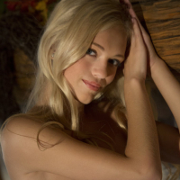 Blonde glamour model Alex Grey exhibiting nice pussy in long socks