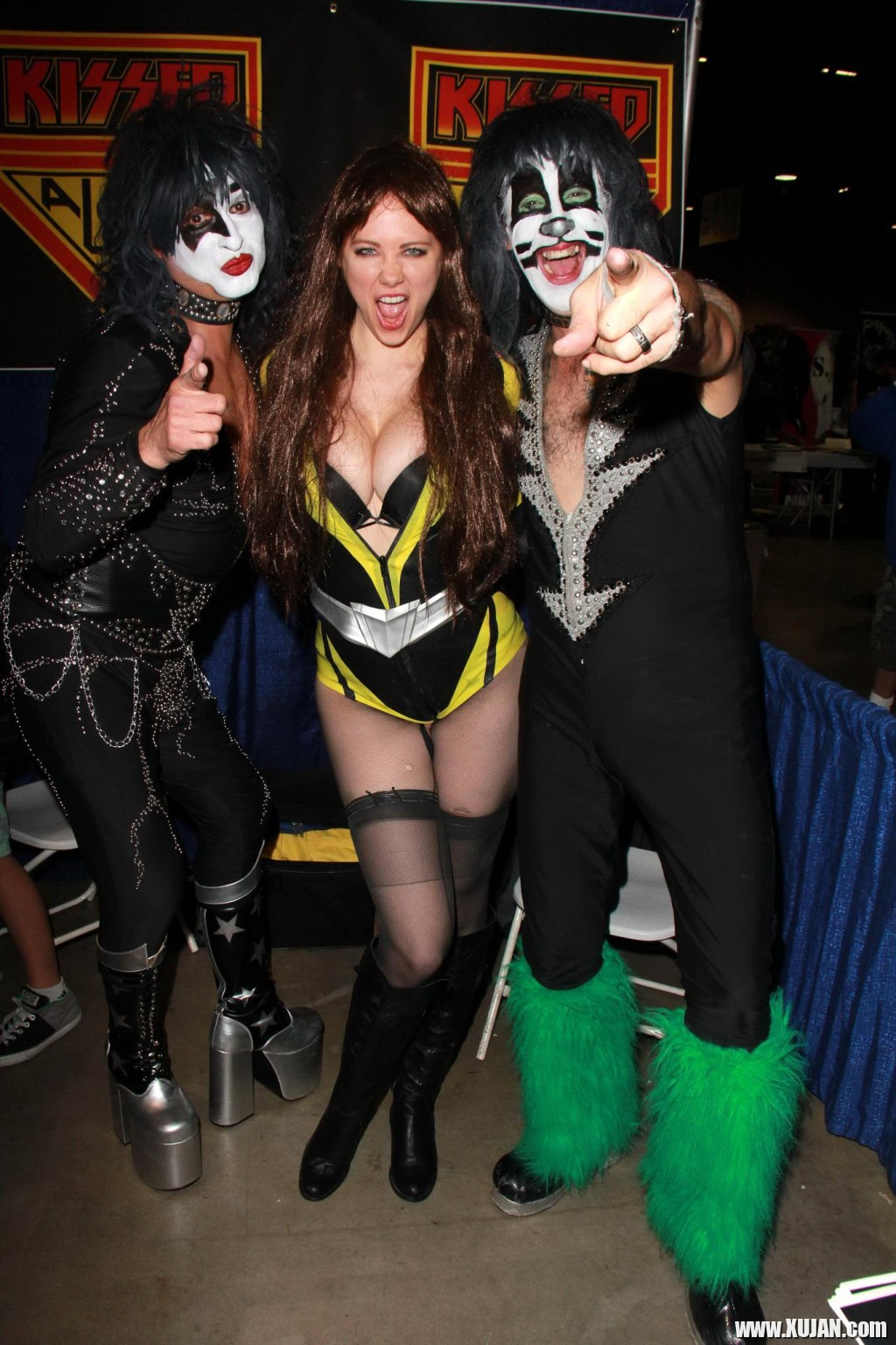 Busty Maitland Ward wearing latex bodysuit fishnets and boots at the Long Beach - Photo #404263
