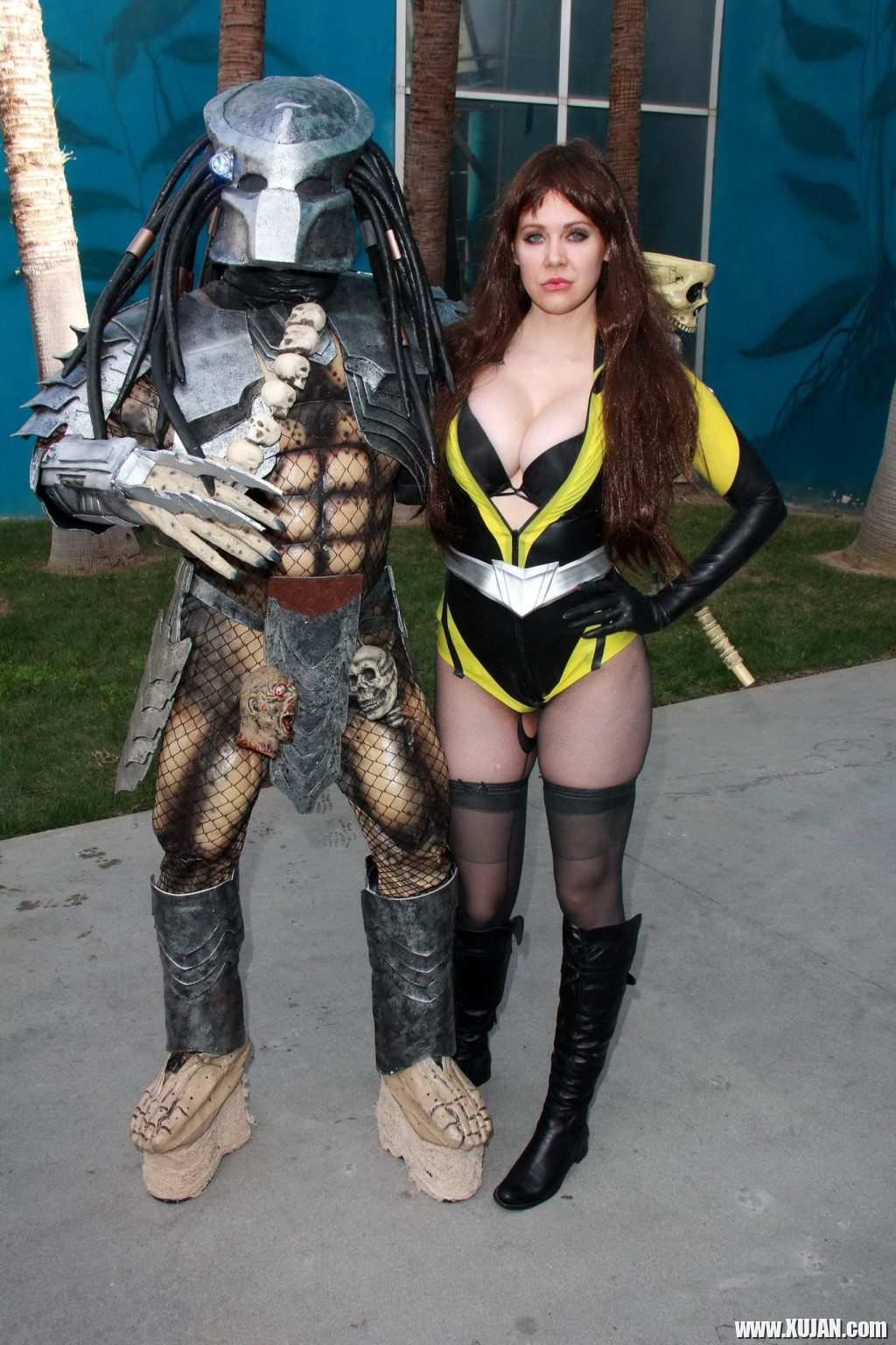 Busty Maitland Ward wearing latex bodysuit fishnets and boots at the Long Beach - Photo #404268