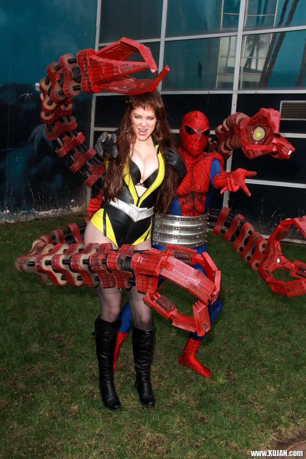 Busty Maitland Ward wearing latex bodysuit fishnets and boots at the Long Beach - Photo #404269