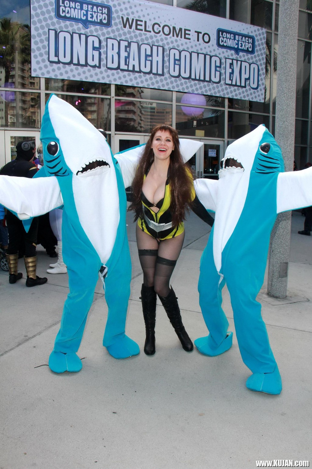 Busty Maitland Ward wearing latex bodysuit fishnets and boots at the Long Beach - Photo #404271