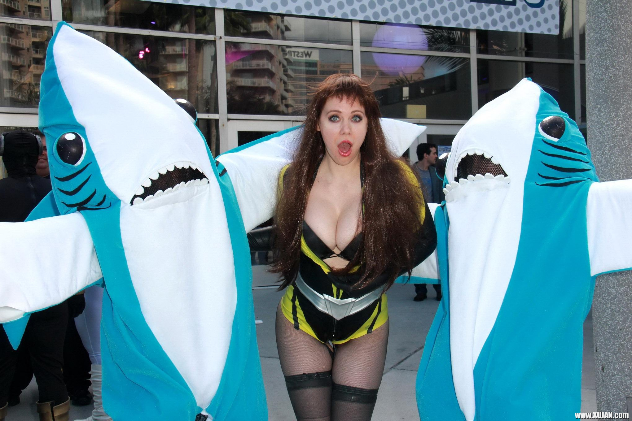 Busty Maitland Ward wearing latex bodysuit fishnets and boots at the Long Beach - Photo #404272