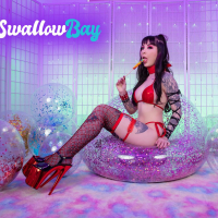 Tattooed bitch Charlotte Sartre in red bikini and stilettos swallows cock