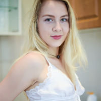 Hot blonde babe Alecia Fox in white lingerie posing in the kitchen
