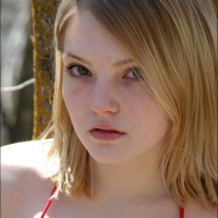 Pictures of Cute Chloe showing her love for Coed Cherry