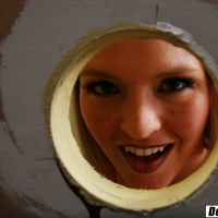 Naughty hot babe Krissy Lynn sucking black cock on a glory hole