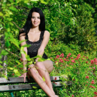 Lola Marron sitting on a Bench showing her Pussy