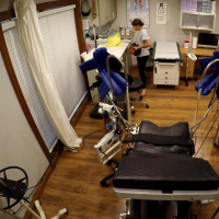 Michelle Anderson getting a gyno exam while her boyfriend watching