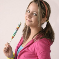 Cute amateur Andi Pink plays with candy