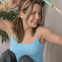 Cute amateur Andi Pink plays with candy