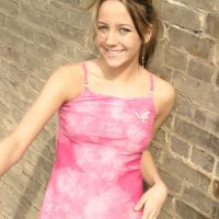 Sexy teen Andi Pink by a fire escape