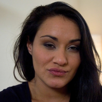 Jade Indica posing with Charley Chase in pajamas