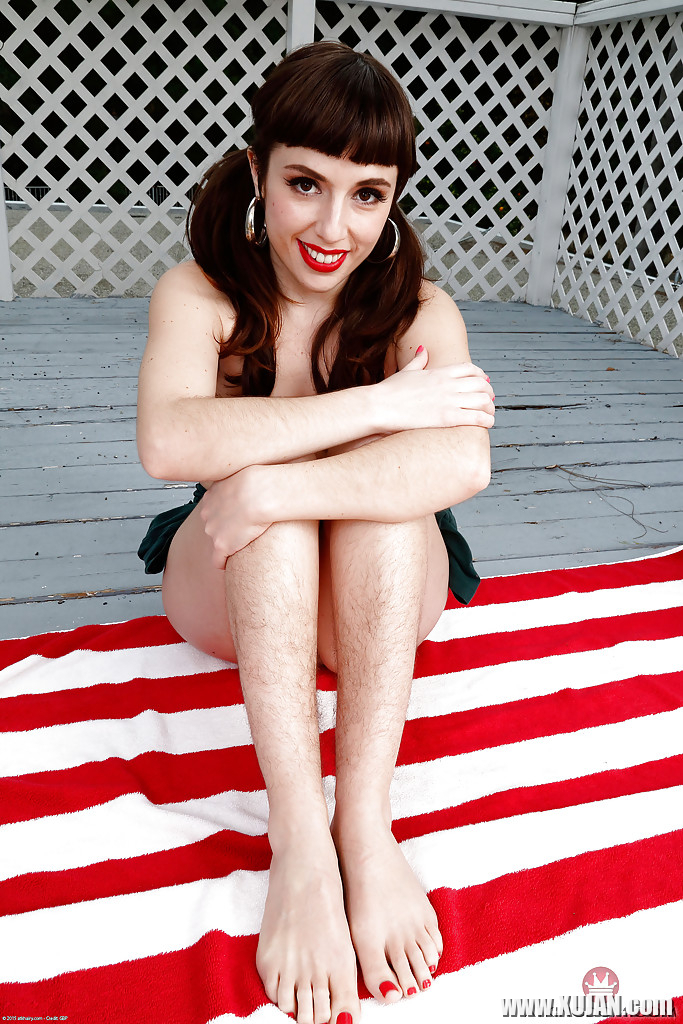 Older all natural model Simone Delilah revealing beaver on patio in pigtails - Photo #470110
