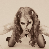Classic Goth fetish Delilah shows off her corset