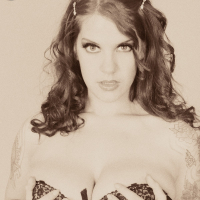 Classic Goth fetish Delilah shows off her corset