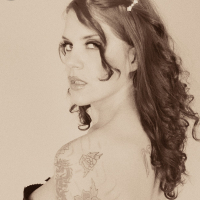 Classic Goth fetish Delilah shows off her corset