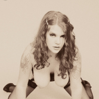 Classic Goth fetish Delilah shows off her corset