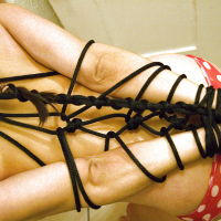 Busty Latina fetish model Monica Mendez is rope tied in bathroom
