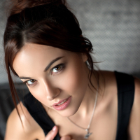 Elizabeth Marxs slowly strips off her little black dress