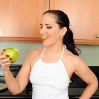 Brunette Caroline Pierce strips off in the kitchen