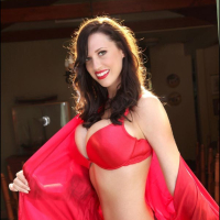 Busty pinup Lana Kendrick in sexy red lingerie