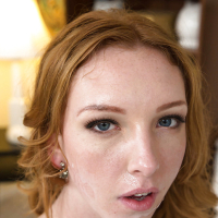 Fully clothed redhead Katy Kiss licks and sucks a thick cock up close
