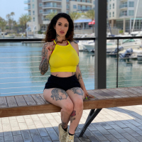 Tattooed slut Arabelle Raphael riding a dick while her big tits bounce