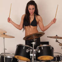 Naked Rocker Valentina Ross playing the Drums