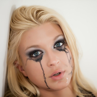 Busty blonde starlet Leya Falcon plays with a huge black dildo