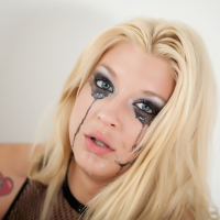 Busty blonde starlet Leya Falcon plays with a huge black dildo
