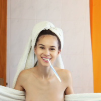 Brunette Leona Mia strips naked in the morning