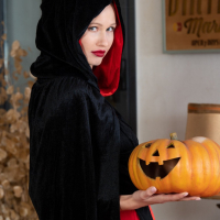 Lovely girl Stella Cardo puts on her new costume for Halloween