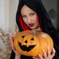 Lovely girl Stella Cardo puts on her new costume for Halloween