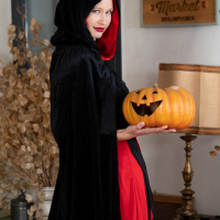 Lovely girl Stella Cardo puts on her new costume for Halloween