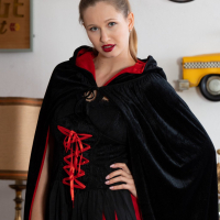 Lovely girl Stella Cardo puts on her new costume for Halloween
