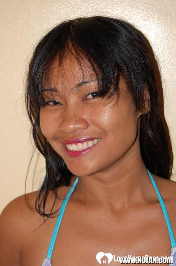 Naughty Asian babe teasing in a bikini - Photo #511423
