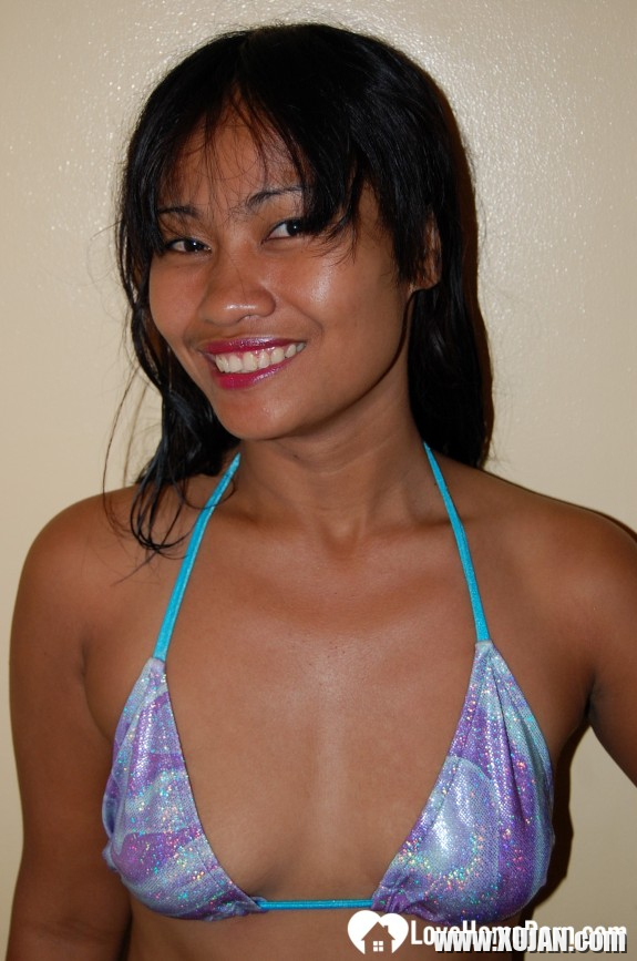 Naughty Asian babe teasing in a bikini - Photo #511431