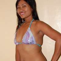 Naughty Asian babe teasing in a bikini