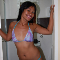 Naughty Asian babe teasing in a bikini