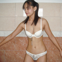 Adorable babe with tiny tits Lana Lane stripping in the bath