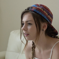 Pretty Alex Blake poses before giving the producer a blowjob