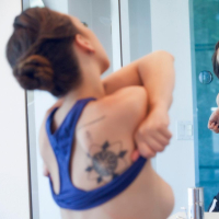 Wet babe Jade Nile showing off tattoos and phat ass in bathroom shower