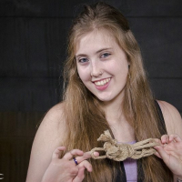 Electra Rayne busty long hair blonde is cross bound in rope