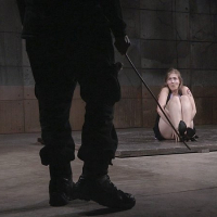Electra Rayne busty long hair blonde is cross bound in rope